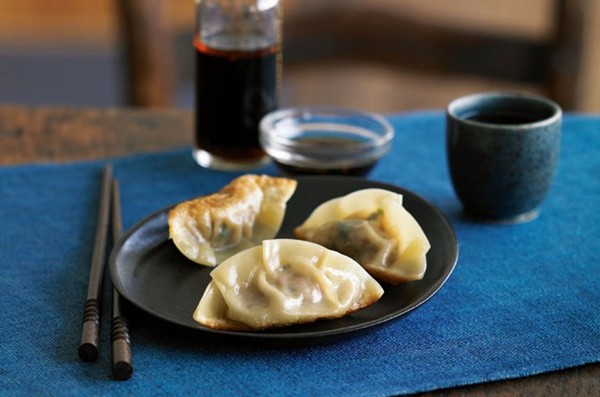 Pot sticker dumplings with ginger-soy dipping sauce