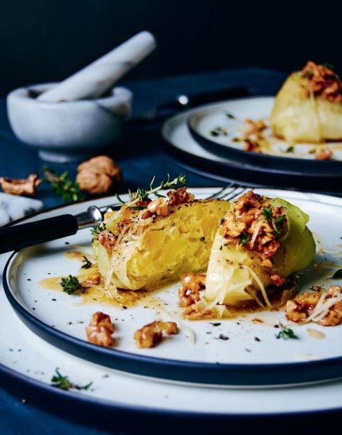 Potato and apple-stuffed cabbage rolls with walnut butter and Gruyère