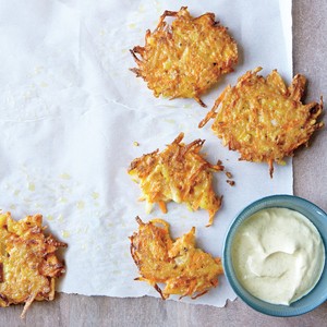 Potato and carrot pancakes with curry sauce