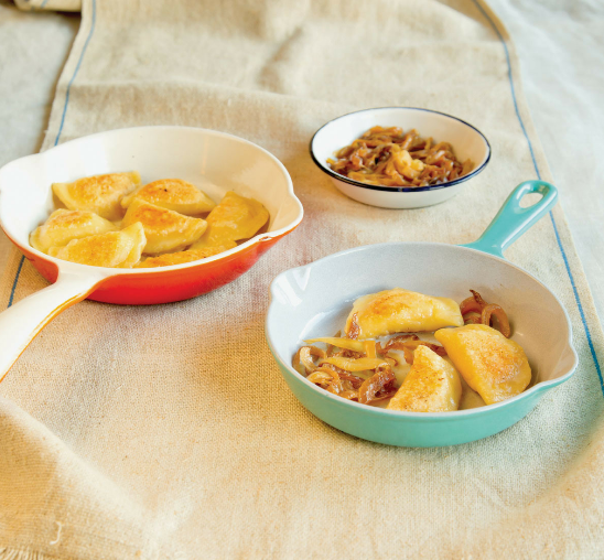 Potato and cheddar pierogies with caramelized onions