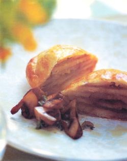 Potato and onion torte or pie with mushroom sauce