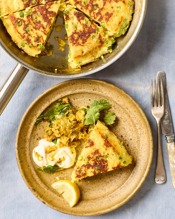 Potato cake with crab, onions and curry leaves