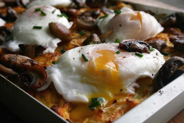 Potato, carrot and rosemary kugel with poached eggs