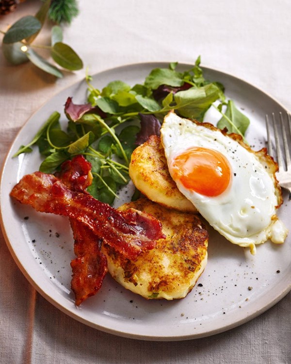 Potato champ cakes with crispy bacon and a fried egg