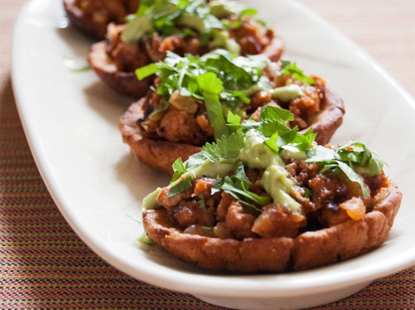 Potato-chorizo sopes with avocado crema