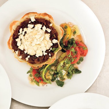 Potato-crusted goat cheese tarts with heirloom tomato salad