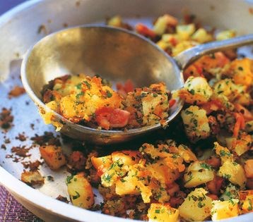 Potato cubes with crispy bacon and herb gremolata