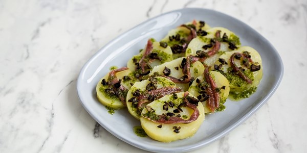 Potato dischetti with anchovy and capers