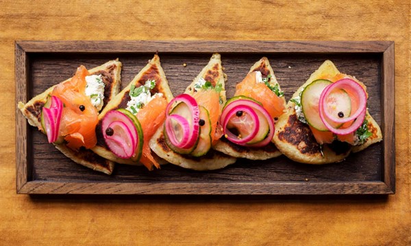 Potato farls with smoked salmon and pickled cucumber