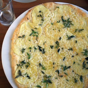 Potato, Fontina, and oregano pizza