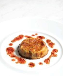 Potato gateau with hickory smoked bacon, onions, and Comté