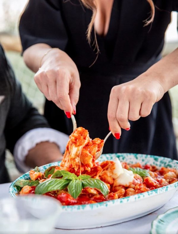 Potato gnocchi baked with tomato and cheese (Gnocchi alla Sorrentina)