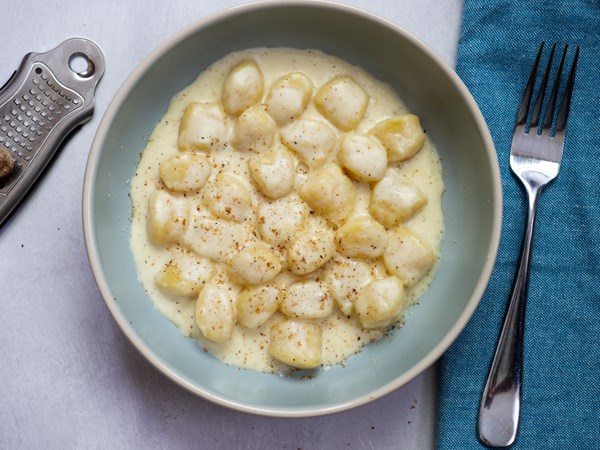 Potato gnocchi with Fontina cheese sauce (Gnocchi alla bava)
