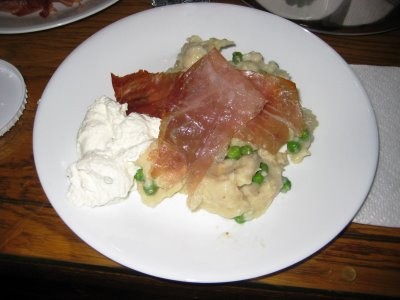 Potato gnocchi with peas, prosciutto, and ricotta