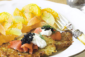 Potato latkes with smoked salmon, caviar, and tarragon crème fraîche