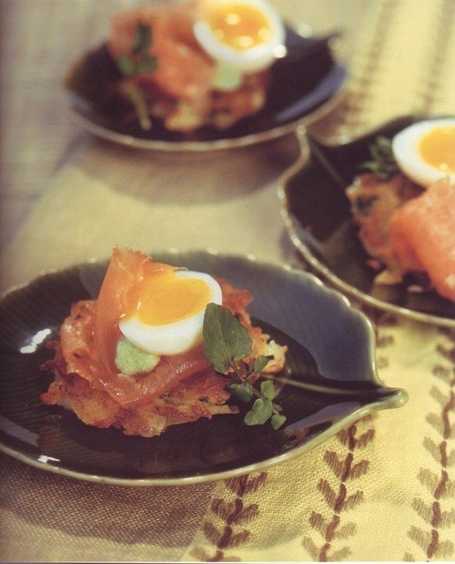 Potato latkes with smoked salmon, quail eggs, and watercress