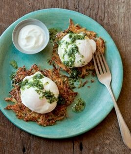 Potato pancakes, poached eggs, and green onion sauce