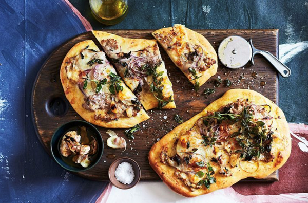 Potato pizza with Italian sausage and Fontina cheese