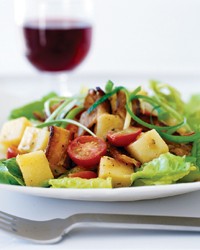 Potato salad with bacon and tomatoes