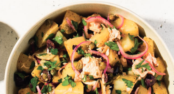 Potato salad with capers, olives and olive oil tuna