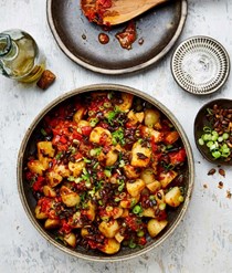 Potato salad with charred tomato and orange salsa