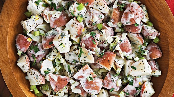 Potato salad with fried garlic and herbs