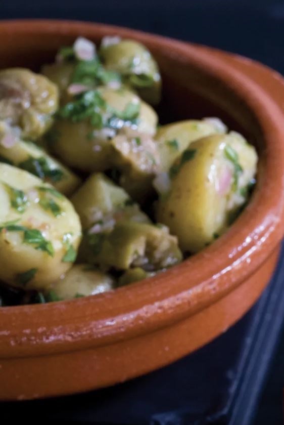 Potato salad with mayonnaise, capers and onion