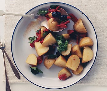 Potato salad with olives and peppers