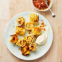 Potato spirals with tomato salsa and creme fraiche