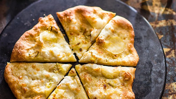 Potato, zucchini flower and buffalo mozzarella pizza