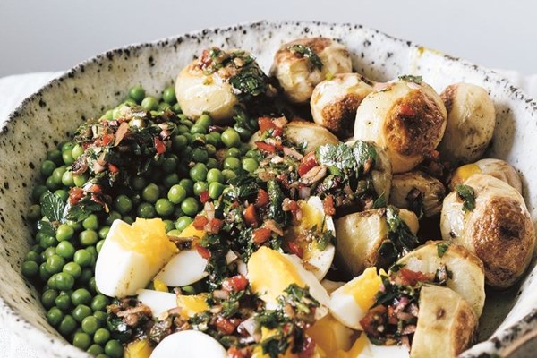 Potatoes, peas and eggs with chimichurri