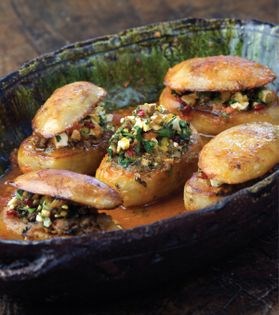 Potatoes stuffed with lamb and fresh herbs (Dolmeh-ye sibzamini)