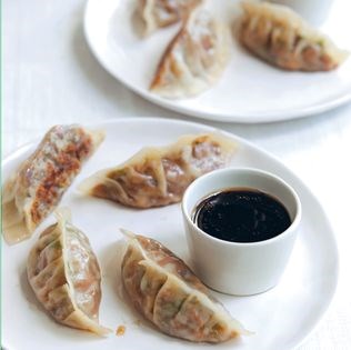 Potsticker dumplings with black vinegar dipping sauce