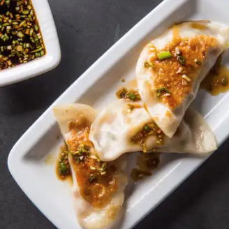 Potstickers with scallion dipping sauce