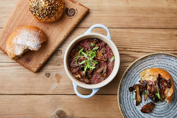 Potted wild mushrooms with spelt and oat rolls