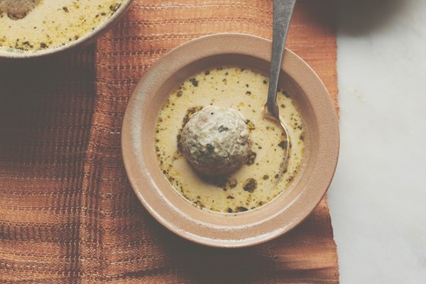 Pounded mutton meatballs in a yoghurt gravy (​​Ghushtaba)