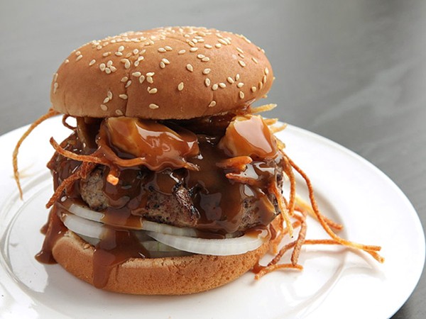 Poutine burger (burgers with fried potatoes, cheese curds, and gravy)