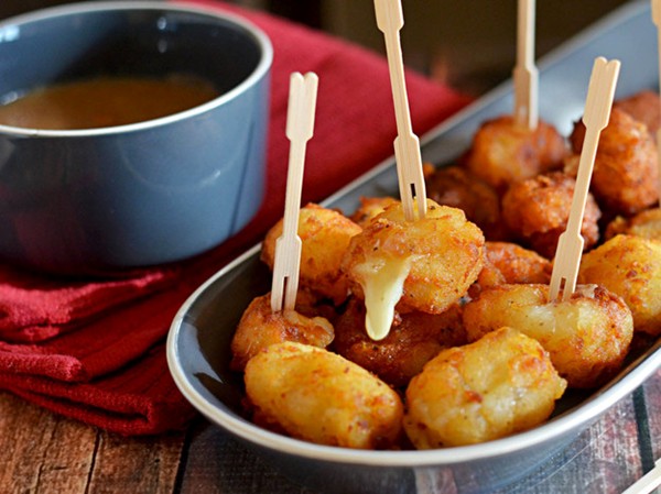 Poutine poppers (Cheese-stuffed potato bites with brown gravy)