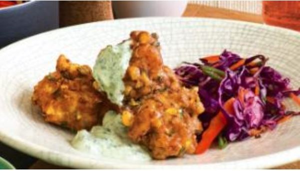 Prawn and corn pakora with green chilli raita and red cabbage salad