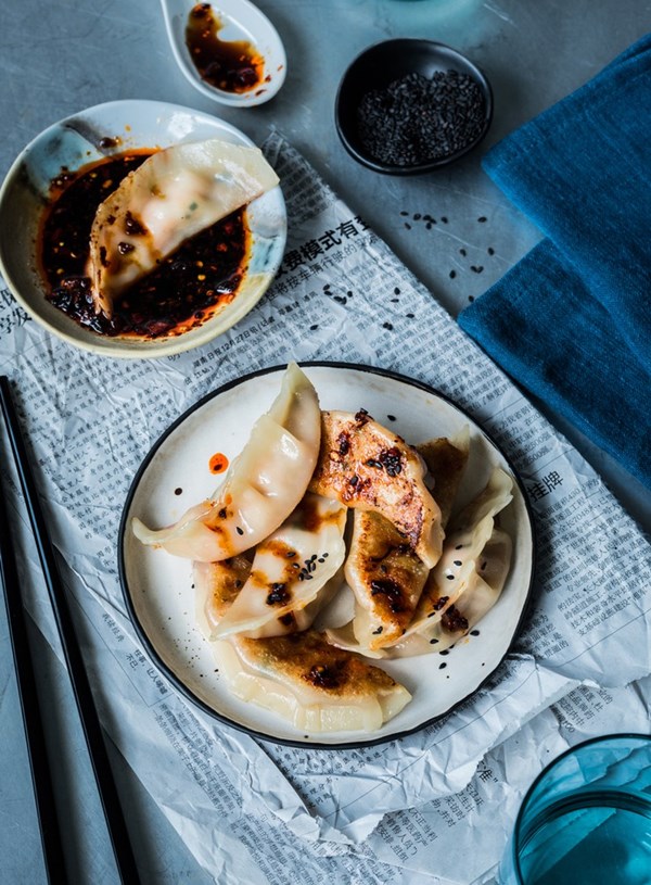 Prawn and ginger dumplings with black vinegar and chilli sauce