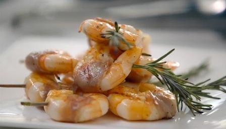 Prawn, prosciutto and rosemary skewers with avocado, ginger and lime salsa