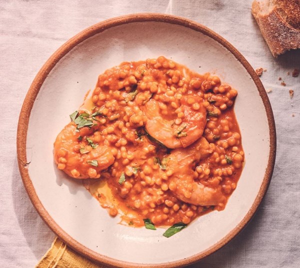 Prawns with a bisque and tomato fregola