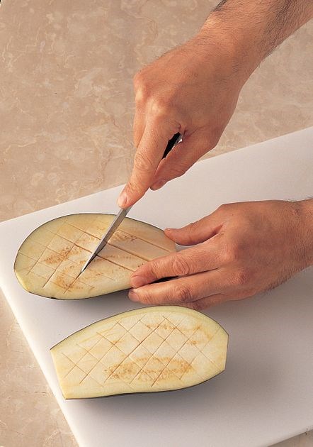 Preparing aubergines for baking