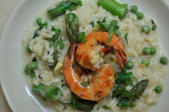 Preserved lemon and spring vegetable risotto with grilled Pernod shrimp