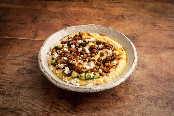 Preserved lemon hummus, chilli oil, ras el hanout chickpeas and pomegranate salad
