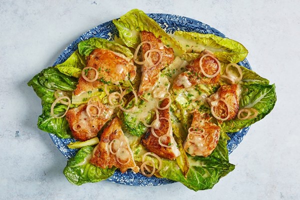  Pressed Caesar chicken thighs with charred baby gem and pickled shallots