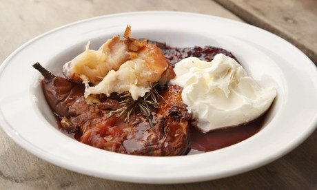 Pressed pears and plums in red wine with rosemary