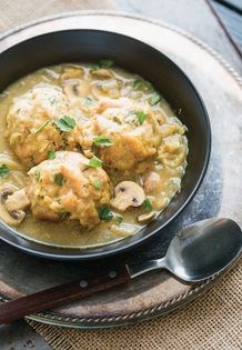 Pretzel dumplings with mushroom-sauerkraut gravy
