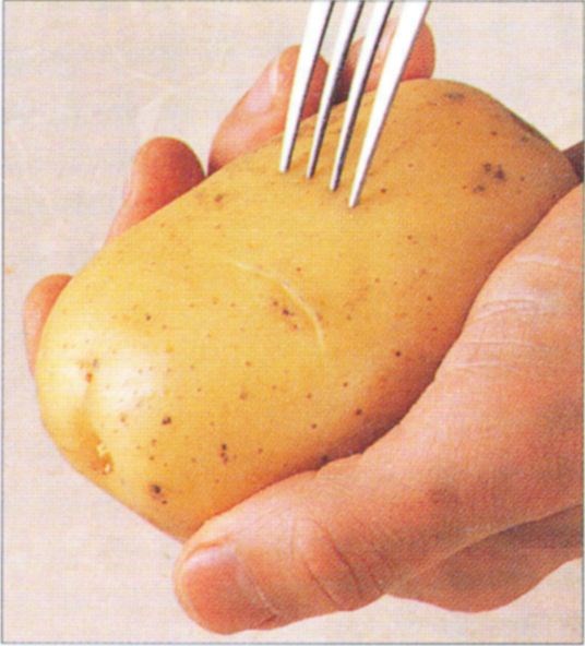 Pricking potatoes for baking