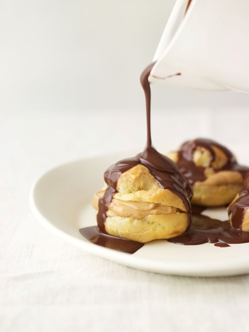 Profiteroles with cardamom-coffee-caramel cream and rich dark chocolate sauce